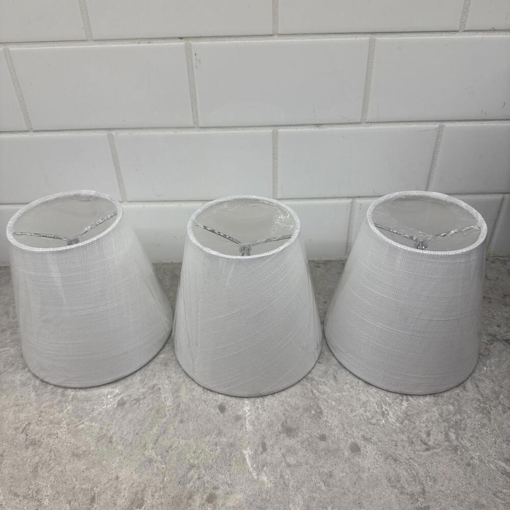 Small white linen clip on lampshades. Lot of 3. Size: 5.5 in x 5 in. New.